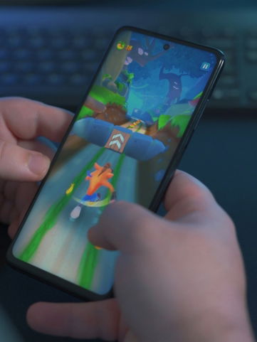 person holding black samsung android smartphone